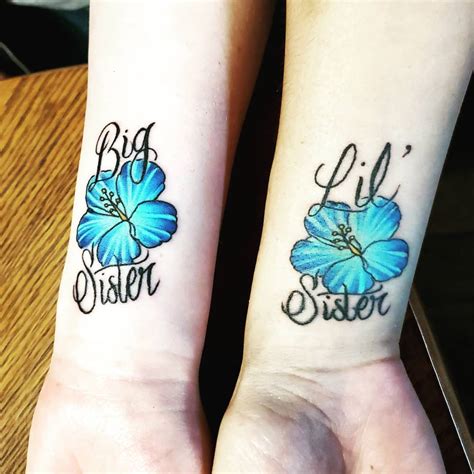 small matching sister tattoos